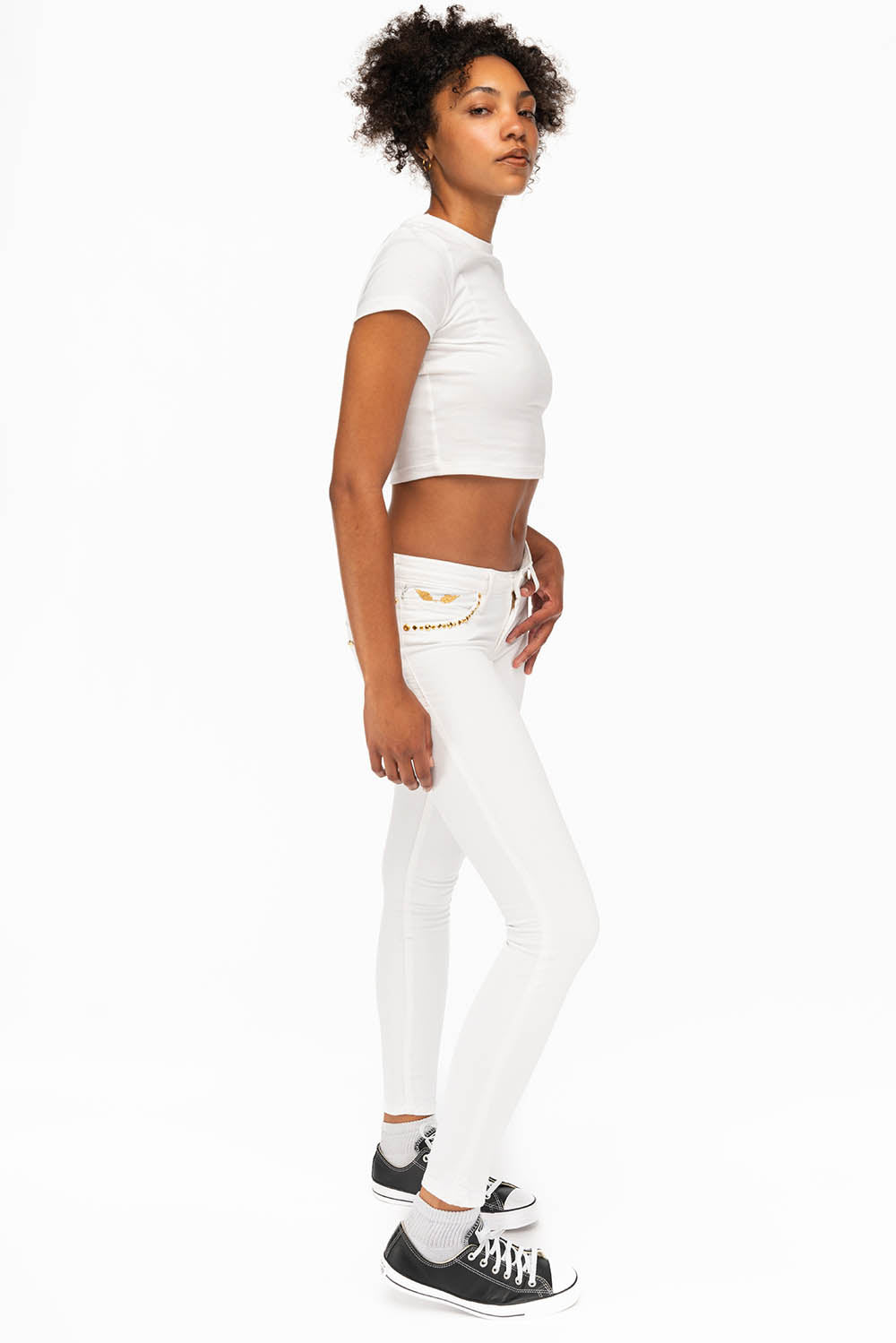 MARILYN WOMENS STUDDED SKINNY JEANS IN WHITE WITH GOLD WINGS AND GOLD STUDS AND CRYSTALS