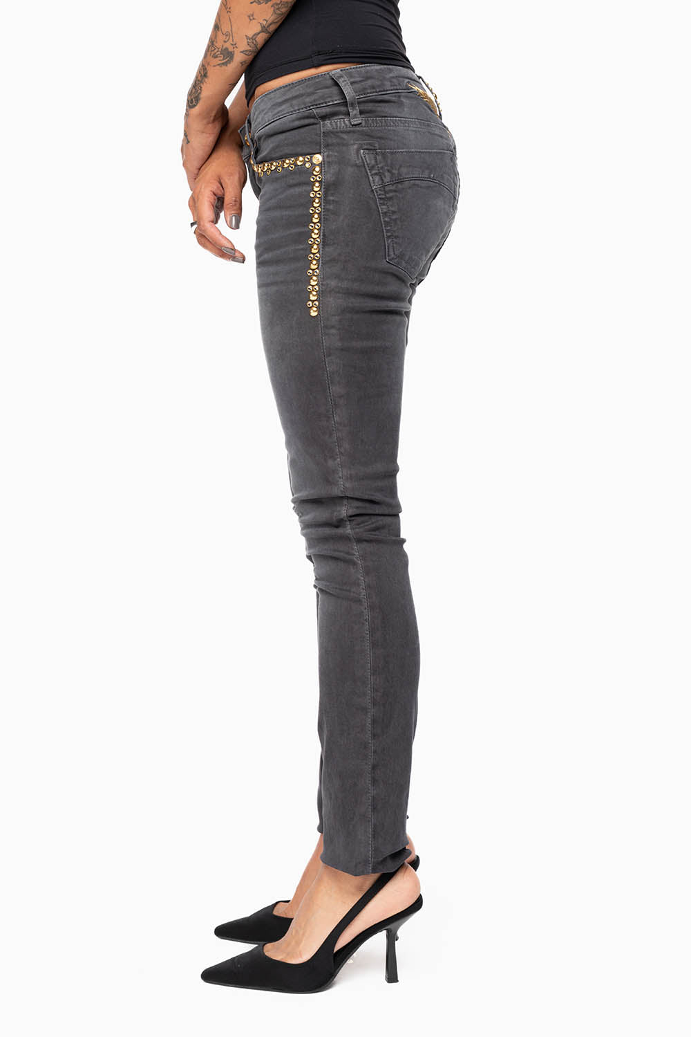 MARILYN WOMENS SKINNY JEANS IN PIGMENT SPRAY CHARCOAL WITH GOLD WINGS EMBELLISHED WITH CRYSTALS & STUDS