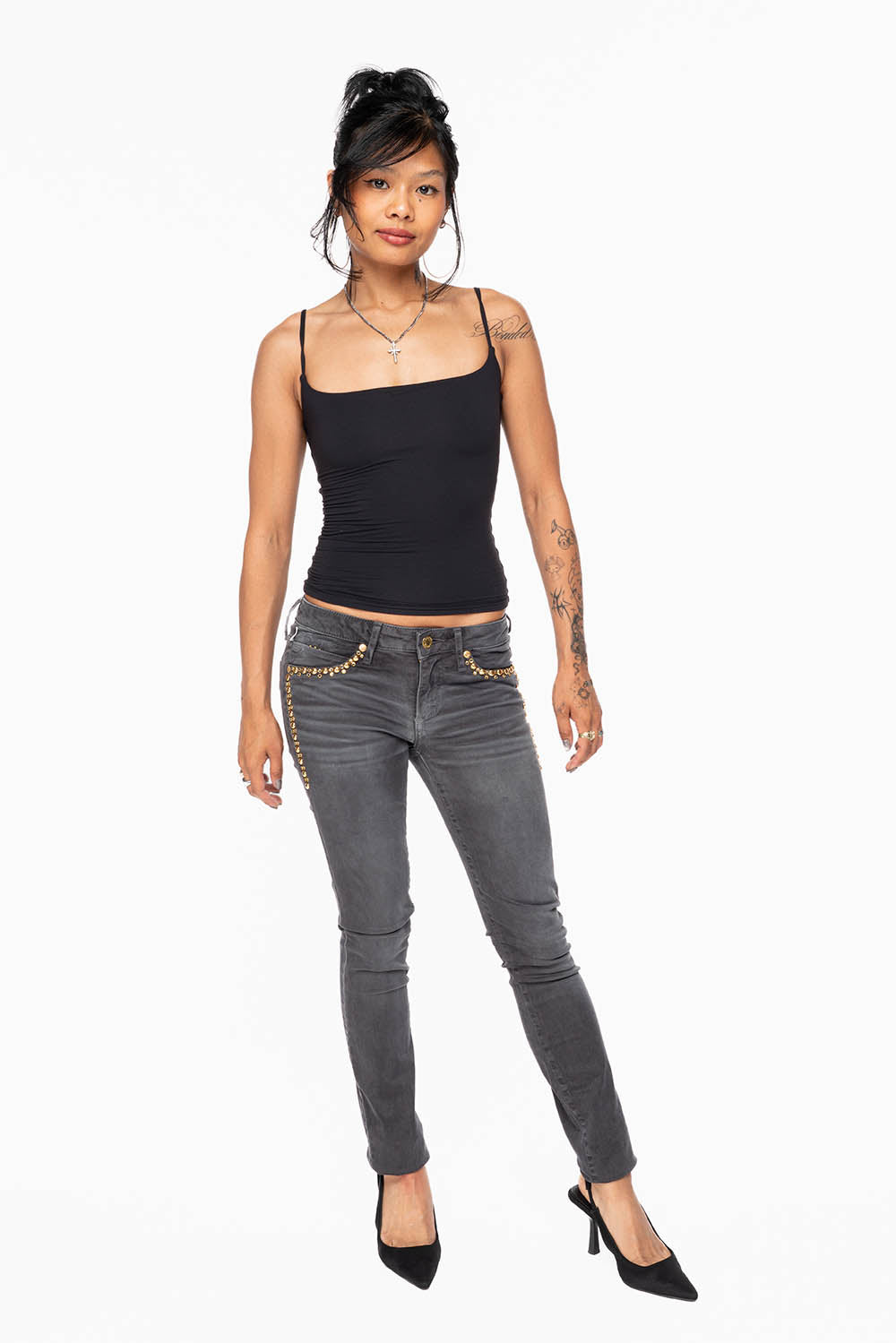 MARILYN WOMENS SKINNY JEANS IN PIGMENT SPRAY CHARCOAL WITH GOLD WINGS EMBELLISHED WITH CRYSTALS & STUDS