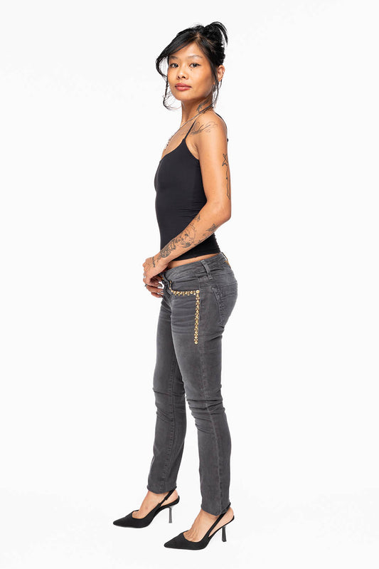 MARILYN WOMENS SKINNY JEANS IN PIGMENT SPRAY CHARCOAL WITH GOLD WINGS EMBELLISHED WITH CRYSTALS & STUDS