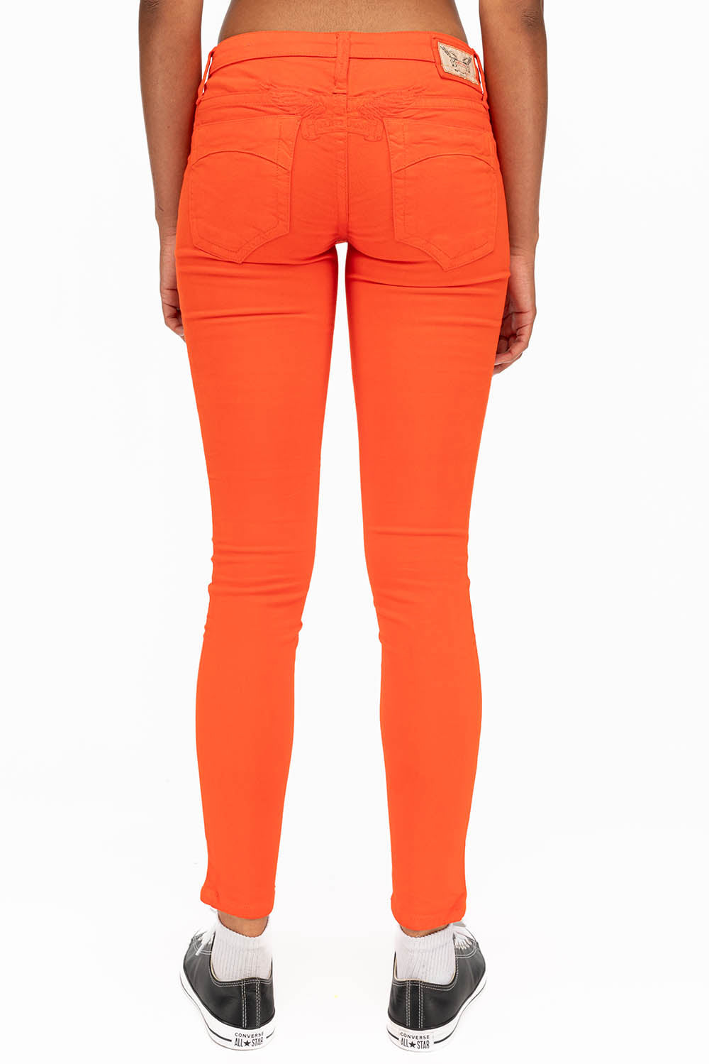 MARILYN WOMENS SKINNY JEANS IN TANGERINE WITH TONAL WINGS