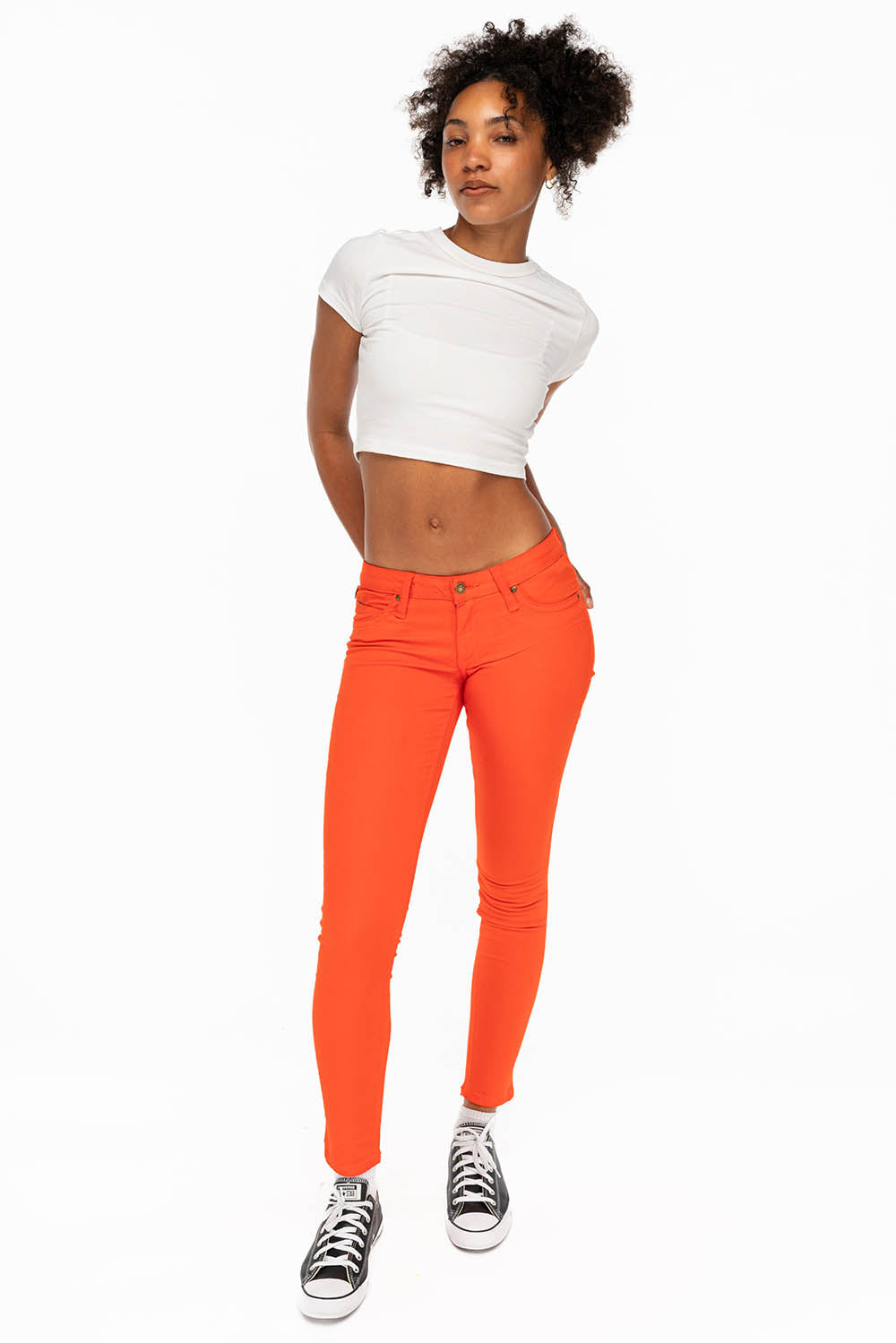 MARILYN LOW RISE WOMENS SKINNY JEANS IN TANGERINE WITH TONAL WINGS