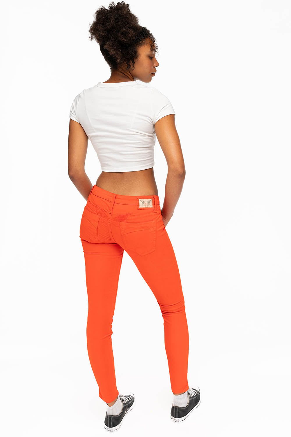 MARILYN WOMENS SKINNY JEANS IN TANGERINE WITH TONAL WINGS