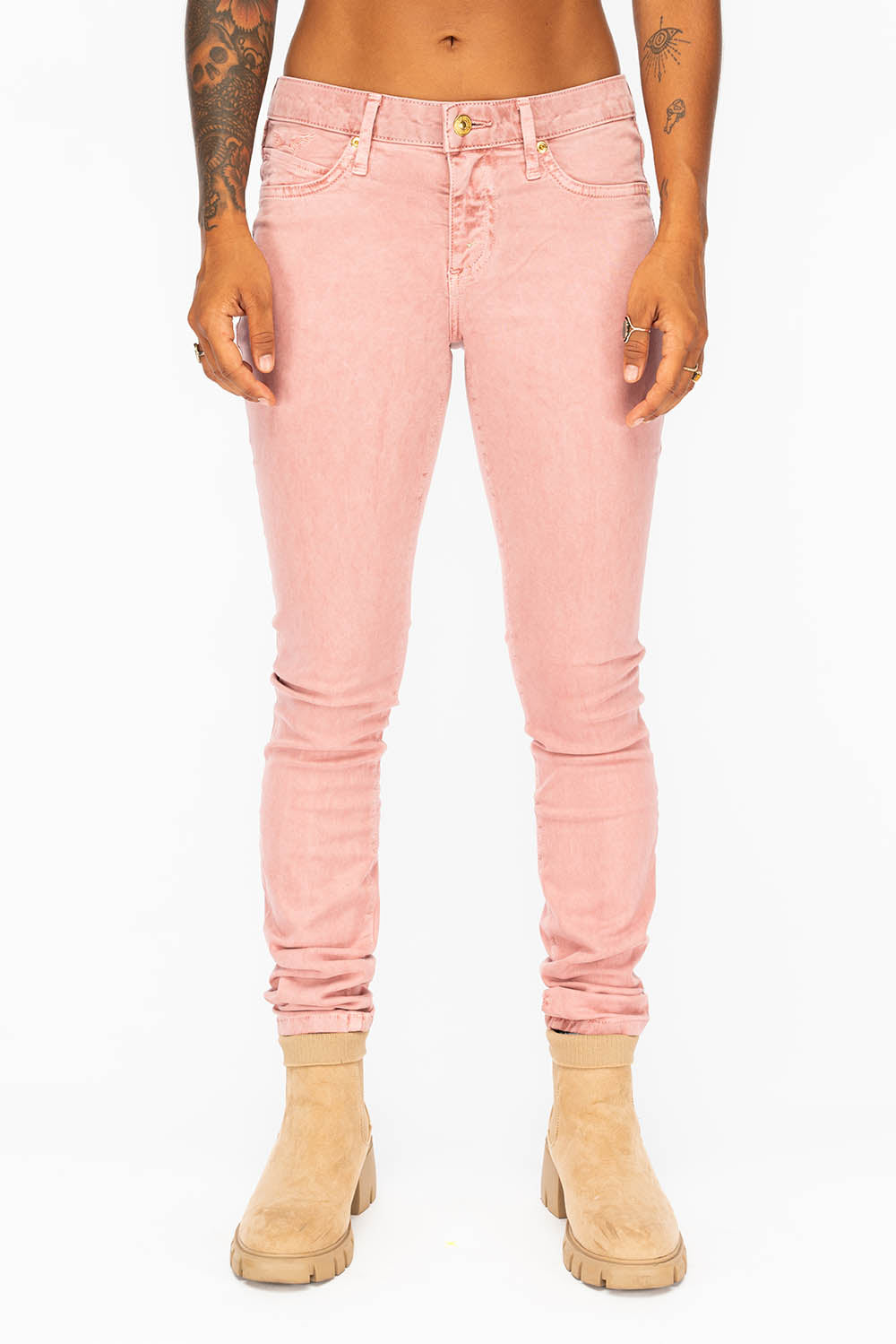 MID RISE WOMENS SKINNY JEANS IN LIGHT PINK WASH