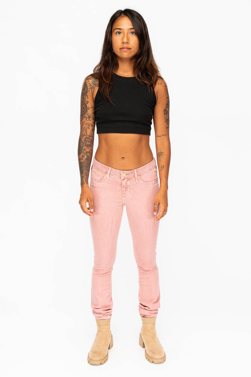 MID RISE WOMENS SKINNY JEANS IN LIGHT PINK WASH