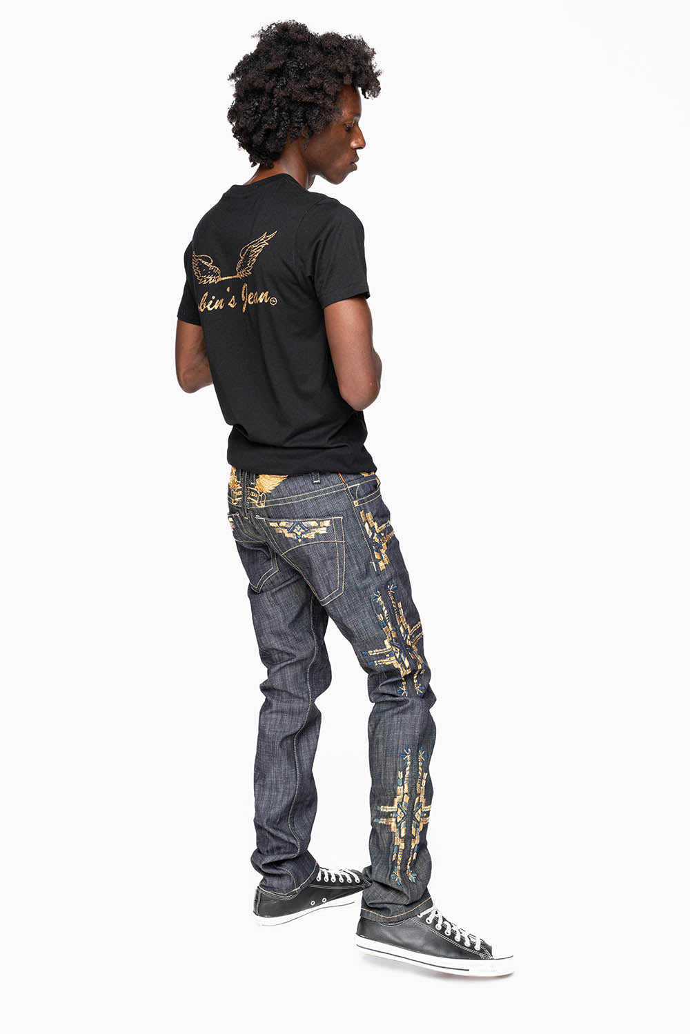 ROBIN’S MEN  SLIM JEAN IN CHAPA GOLD INDIGO RAW DENIM WITH GOLD WING AND CHAPA EMBROIDERY