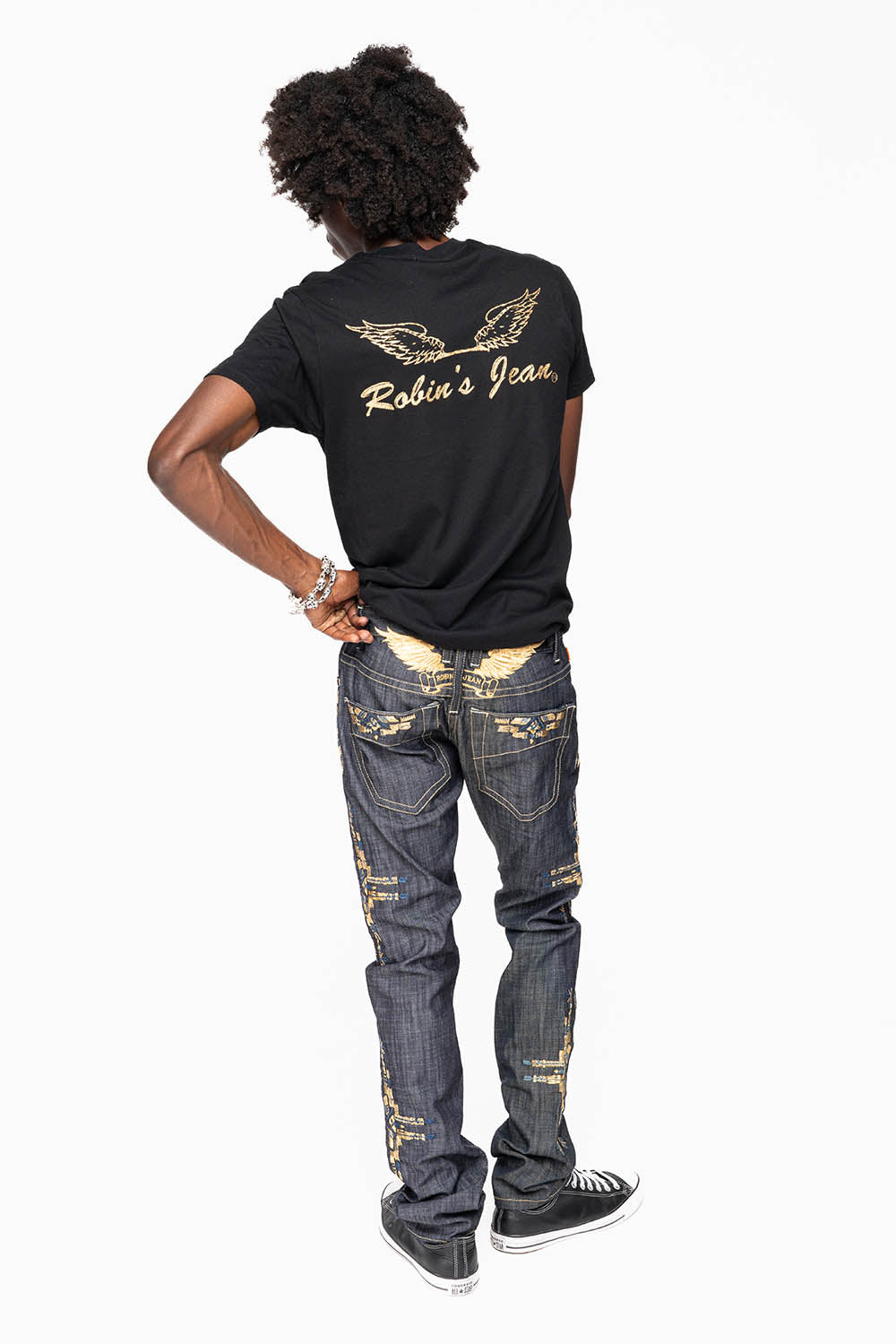 ROBIN’S MEN  SLIM JEAN IN CHAPA GOLD INDIGO RAW DENIM WITH GOLD WING AND CHAPA EMBROIDERY