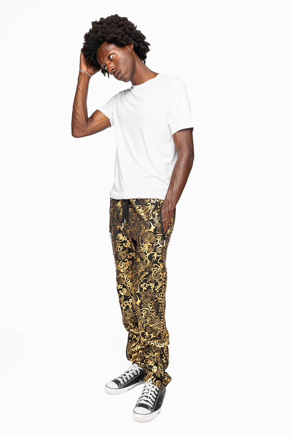 CLOUD JOGGER IN GOLD/BLACK PRINT EMBELLISHED WITH LARGE CRYSTALS
