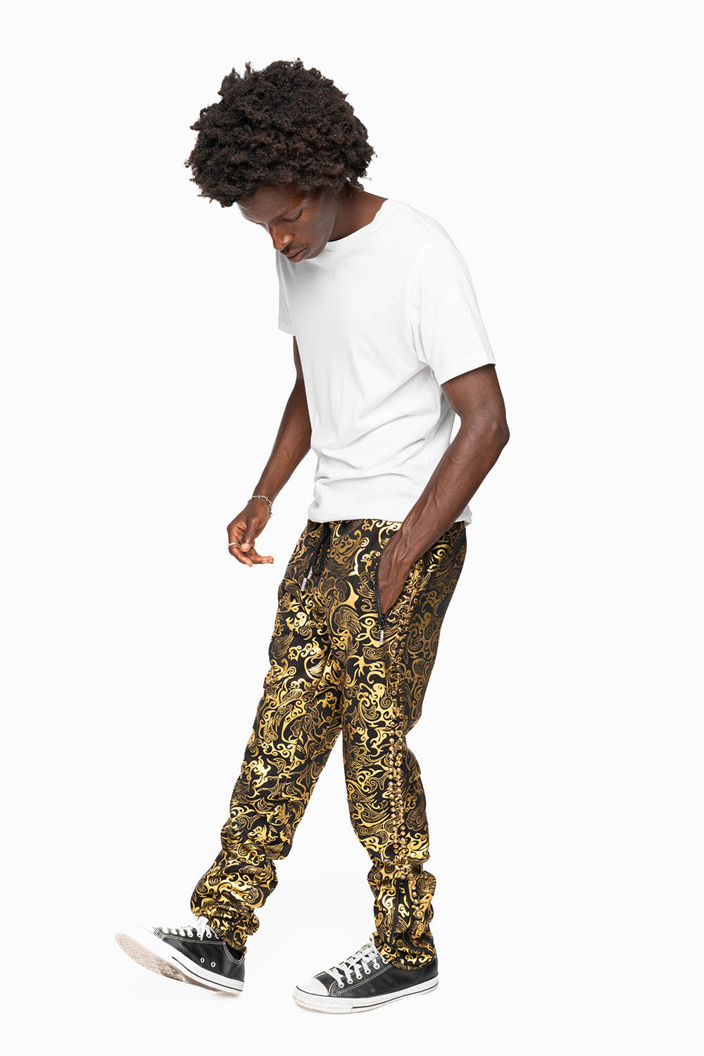CLOUD JOGGER IN GOLD/BLACK PRINT EMBELLISHED WITH LARGE CRYSTALS