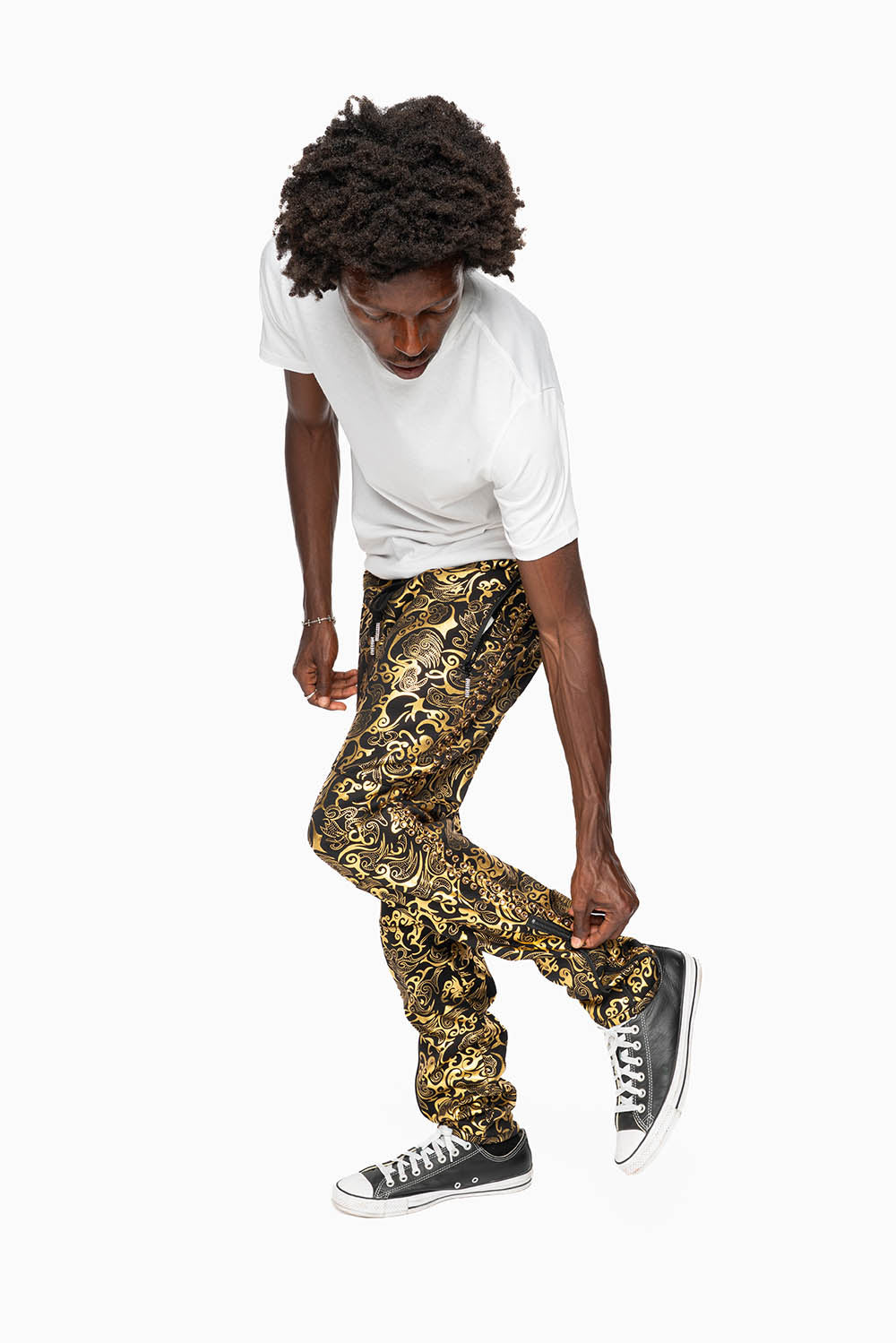 CLOUD JOGGER IN GOLD/BLACK PRINT EMBELLISHED WITH LARGE CRYSTALS
