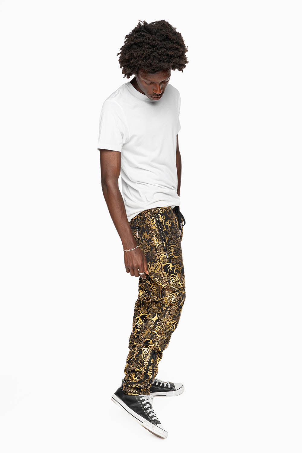 CLOUD JOGGER IN GOLD/BLACK PRINT EMBELLISHED WITH LARGE CRYSTALS