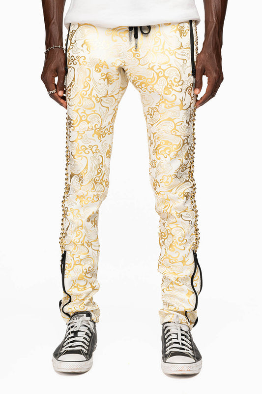 CLOUD JOGGER IN GOLD/WHITE PRINT EMBELLISHED WITH LARGE CRYSTALS