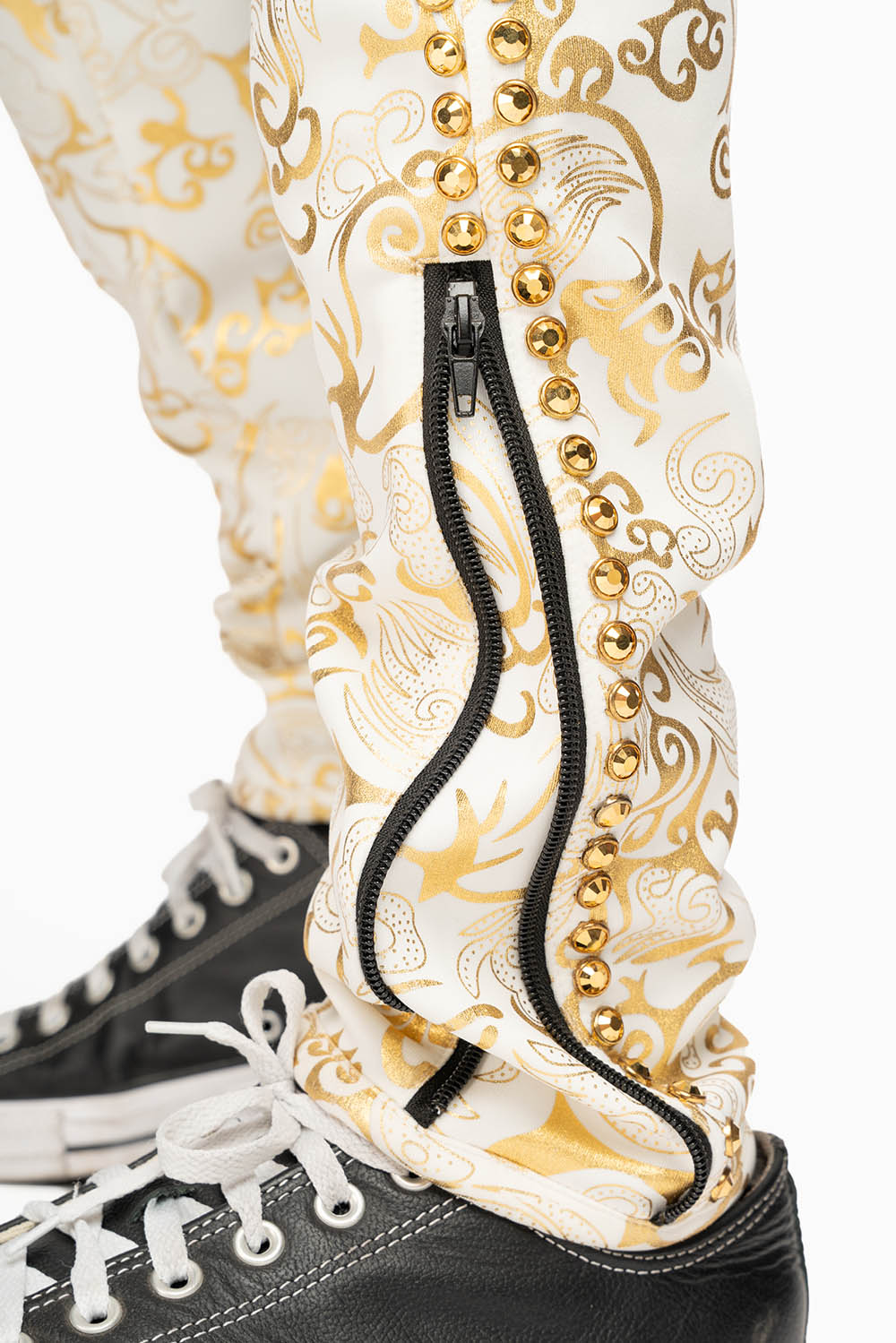 CLOUD JOGGER IN GOLD/WHITE PRINT EMBELLISHED WITH LARGE CRYSTALS
