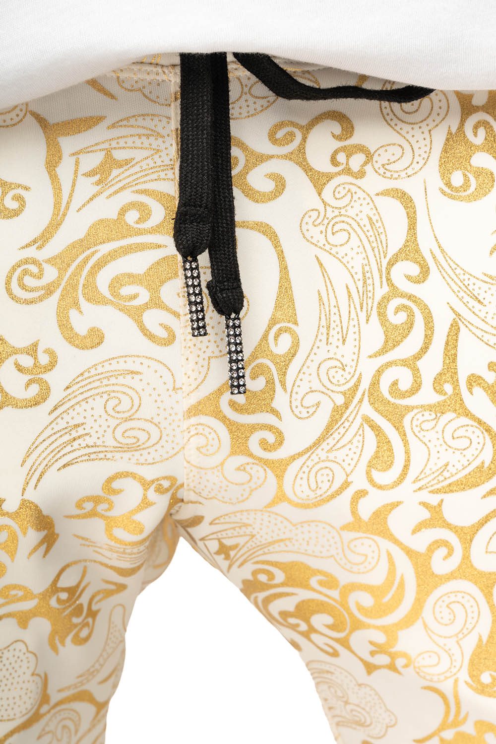 CLOUD JOGGER IN GOLD/WHITE PRINT EMBELLISHED WITH LARGE CRYSTALS