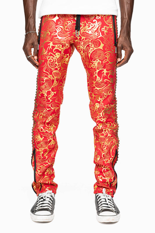 CLOUD JOGGER IN GOLD/RED PRINT EMBELLISHED WITH LARGE CRYSTALS