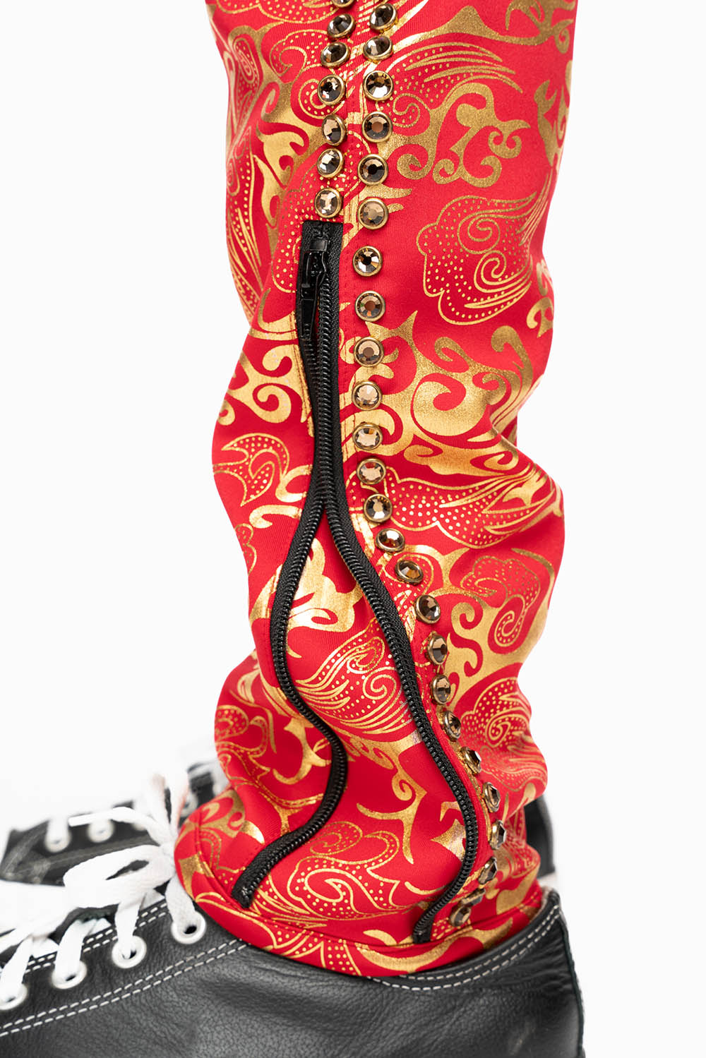 CLOUD JOGGER IN GOLD/RED PRINT EMBELLISHED WITH LARGE CRYSTALS