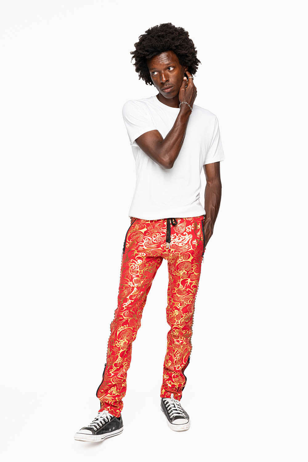 CLOUD JOGGER IN GOLD/RED PRINT EMBELLISHED WITH LARGE CRYSTALS