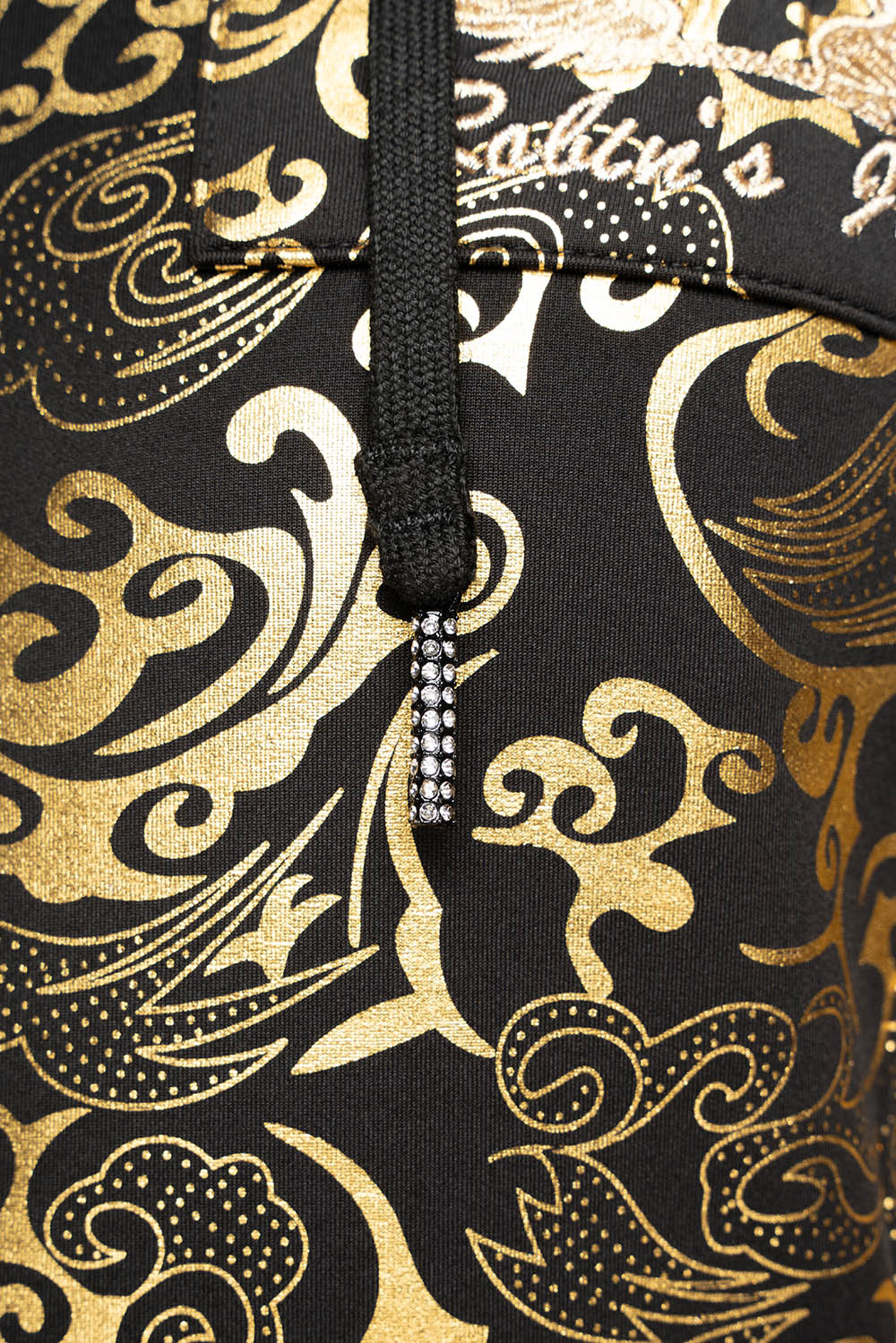 HOODED TRACK JACKET IN GOLD/BLK PRINT WITH LARGE CRYSTALS