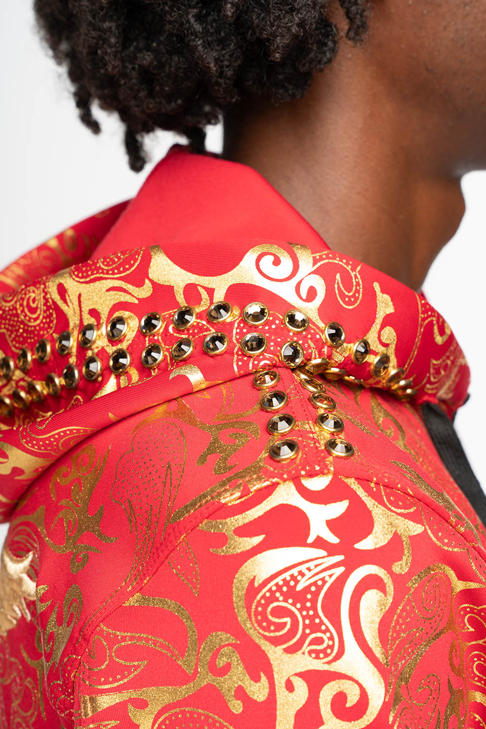 HOODED TRACK JACKET IN GOLD/RED PRINT WITH LARGE CRYSTALS
