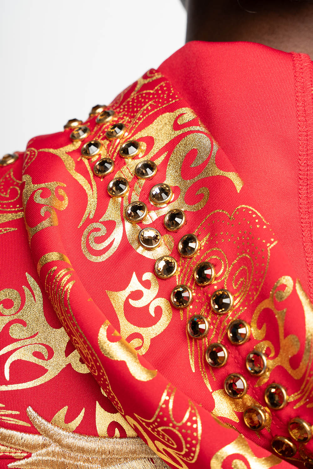 HOODED TRACK JACKET IN GOLD/RED PRINT WITH LARGE CRYSTALS