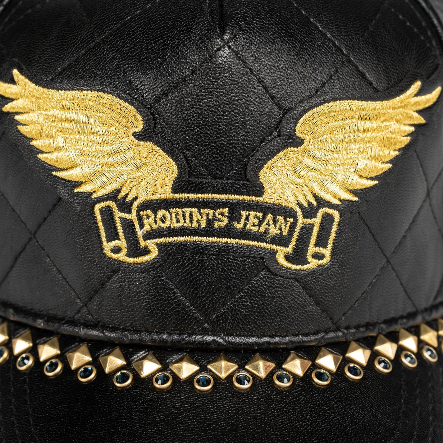 ROBINS LEATHER QUILTED CAP WITH GOLD WINGS STUDS AND CRYSTALS IN BLACK